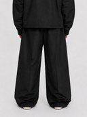 ORBIT Redline pants on model, back